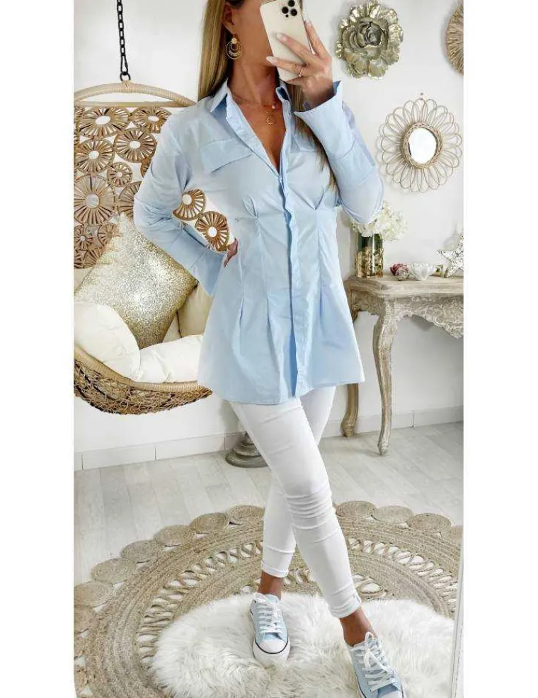 mon_chemisier_long_bleu_c_1.webp My Look Féminin Mon chemisier long bleu ciel taille marquée Clearance